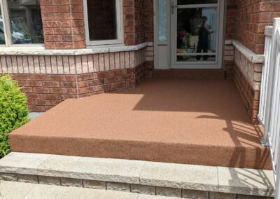 Brown rubber paving at front door