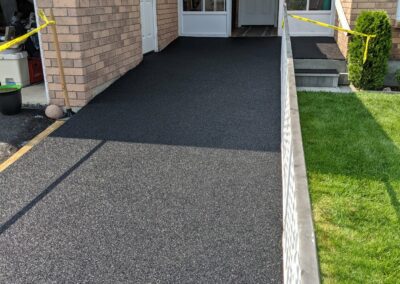 Rubber paving up side of house