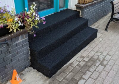 black rubber paved steps